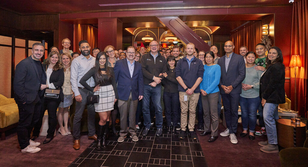 Group shot of coworkers at holiday party