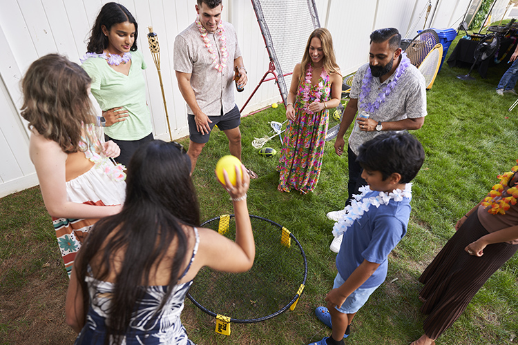 Group of coworkers playing a game at a summer event